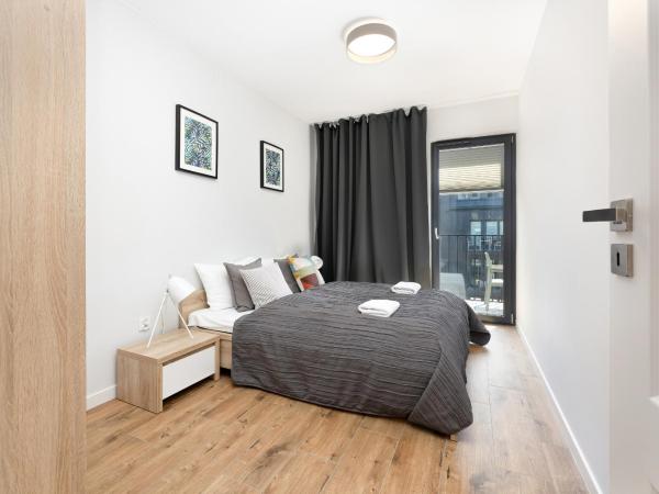 Apartamenty Koło Brzegu by Noclegi Renters : photo 4 de la chambre appartement avec balcon