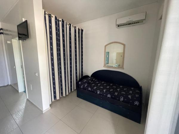 Baia Sangiorgio Hotel & Beach Club : photo 9 de la chambre chambre quadruple - vue sur jardin