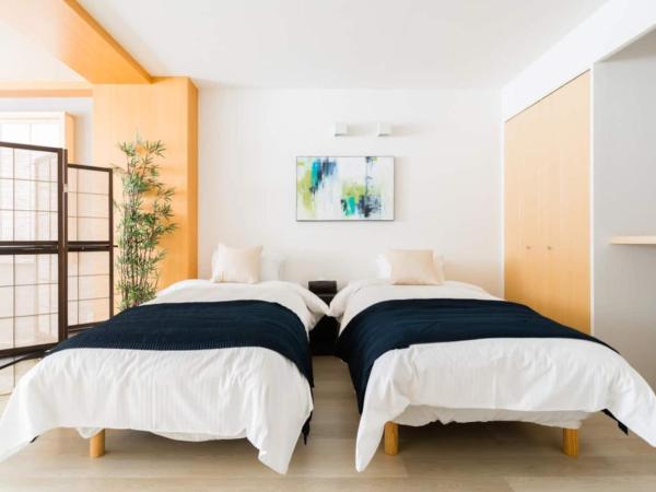 GuestHouse MIYABI : photo 2 de la chambre chambre quadruple avec salle de bains privative