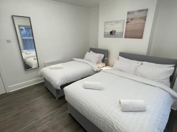 County serviced accommodation : photo 9 de la chambre chambre triple standard