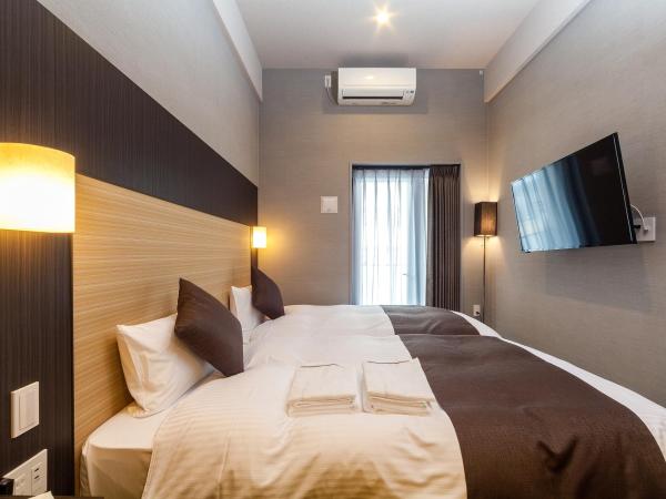 HOTEL SUITE HIROSHIMA YOKOGAWA : photo 3 de la chambre chambre lits jumeaux standard