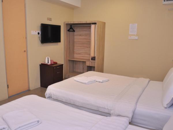 Kuching Transit Inn : photo 1 de la chambre family deluxe (without window)