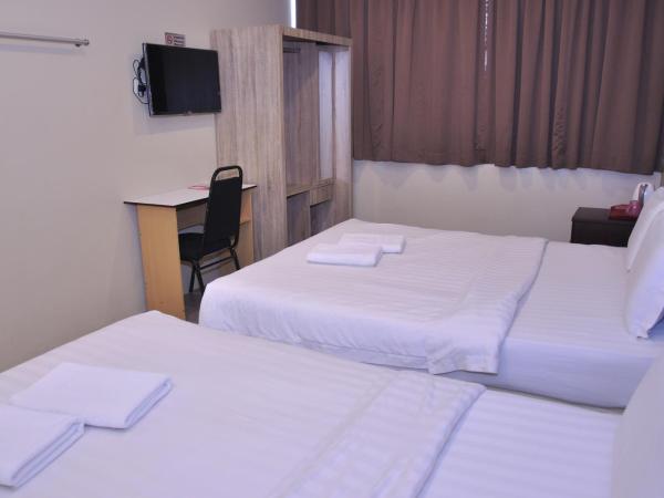 Kuching Transit Inn : photo 10 de la chambre family deluxe (with window)