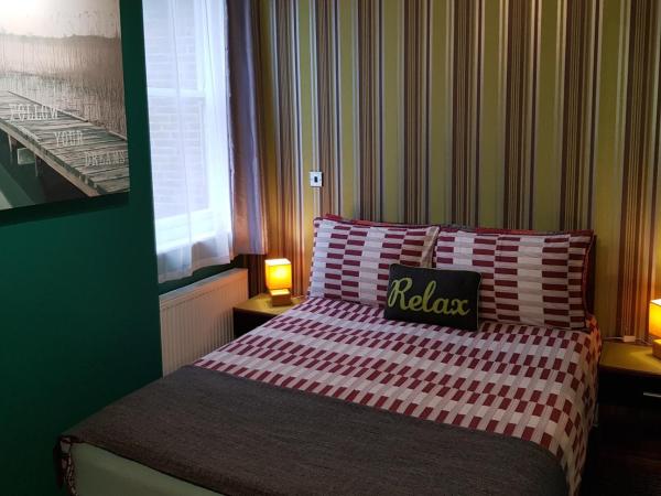 Robin 7 Lodge City Centre : photo 1 de la chambre standard double room with a detached private bathroom