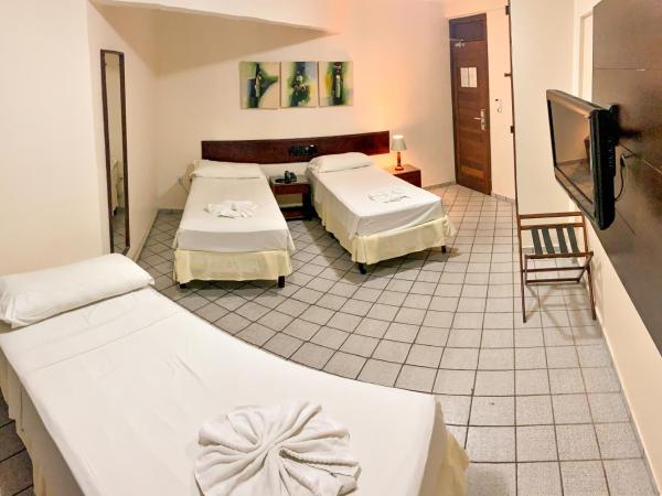 Pizzato Praia Hotel : photo 4 de la chambre chambre triple standard