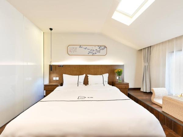 Xingshe Alley Courtyard Hotel Beijing Wangfujing Forbidden City Branch : photo 2 de la chambre skylight double room