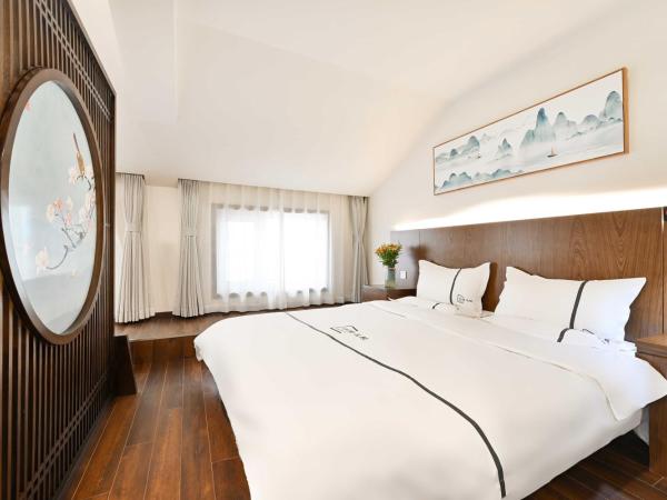 Xingshe Alley Courtyard Hotel Beijing Wangfujing Forbidden City Branch : photo 1 de la chambre skylight family room