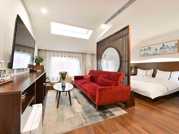 Xingshe Alley Courtyard Hotel Beijing Wangfujing Forbidden City Branch : photo 2 de la chambre skylight family room