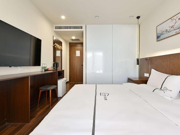 Xingshe Alley Courtyard Hotel Beijing Wangfujing Forbidden City Branch : photo 2 de la chambre sunshine balcony double room