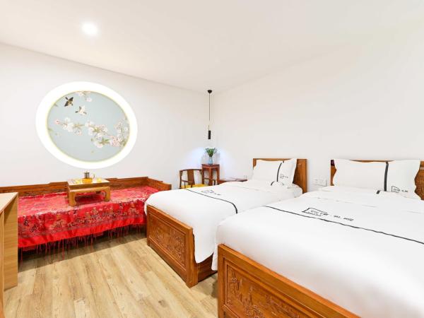 Xingshe Alley Courtyard Hotel Beijing Wangfujing Forbidden City Branch : photo 1 de la chambre chambre triple