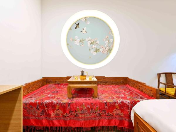 Xingshe Alley Courtyard Hotel Beijing Wangfujing Forbidden City Branch : photo 3 de la chambre chambre triple