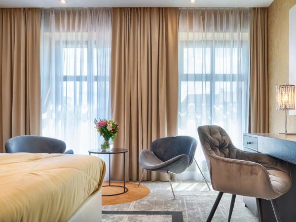 Grand Focus Hotel Szczecin : photo 4 de la chambre appartement