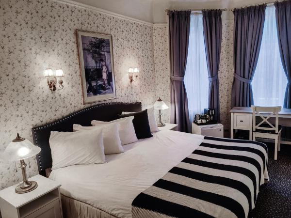 Le Chateau de Pierre : photo 1 de la chambre chambre lit king-size supérieure