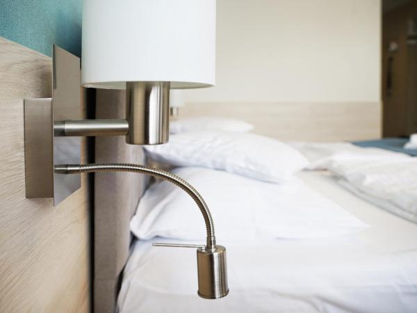 Apartamenty Nad Parsętą Szpitalna 7 : photo 7 de la chambre appartement (2-4 adultes)