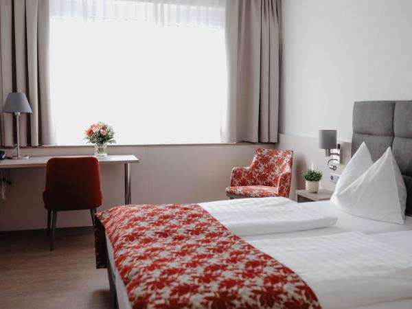 Stadtoase Kolping Hotel : photo 1 de la chambre chambre double ou lits jumeaux
