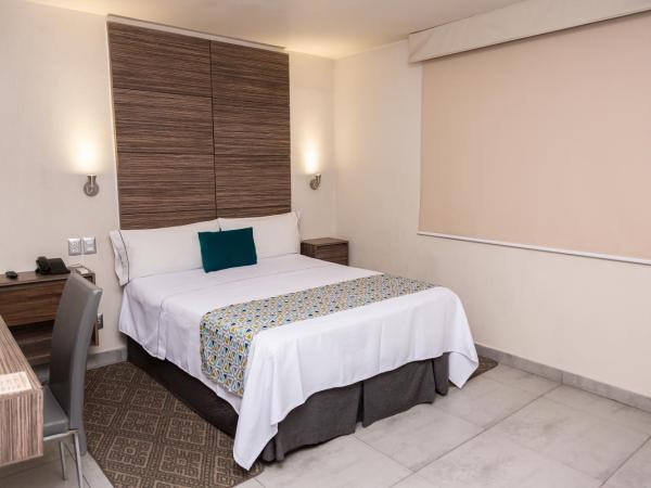 Hotel Expo Abastos : photo 3 de la chambre chambre lit queen-size 