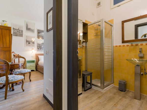 Posto Unico : photo 5 de la chambre chambre double avec salle de bains privative