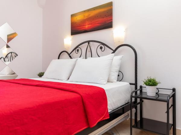 NAXOS DIAMOND Studios Apartments : photo 6 de la chambre chambre triple