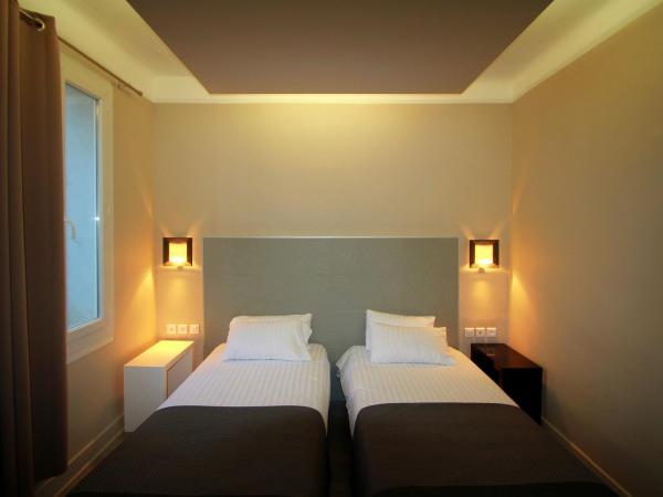 Hôtel Amirauté : photo 1 de la chambre chambre lits jumeaux - vue sur rue