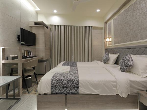 Hotel Elysian Residency : photo 5 de la chambre chambre deluxe double ou lits jumeaux