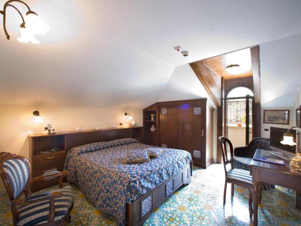 Hotel La Tonnarella : photo 3 de la chambre chambre double ou lits jumeaux supérieure - vue sur jardin