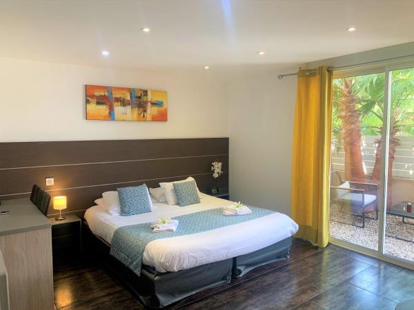 Hotel & Spa Gil de France Cap d'Agde : photo 1 de la chambre suite junior avec terrasse et accès à la piscine chauffée
