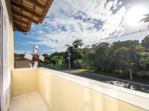 Pousada Casuarina Ferradura : photo 5 de la chambre chambre quadruple