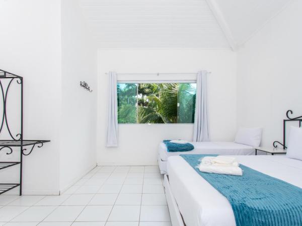 Pousada Casuarina Ferradura : photo 9 de la chambre chambre quadruple