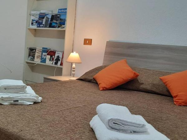 Flamingo Guest House- Rooms : photo 3 de la chambre chambre lit king-size - vue sur jardin