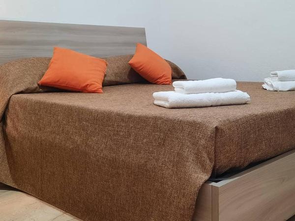 Flamingo Guest House- Rooms : photo 1 de la chambre chambre lit king-size - vue sur jardin