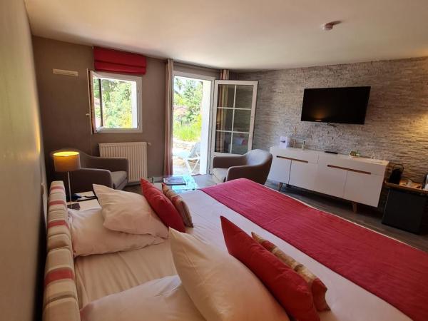 Hôtel Les Prateaux : photo 1 de la chambre chambre deluxe double ou lits jumeaux