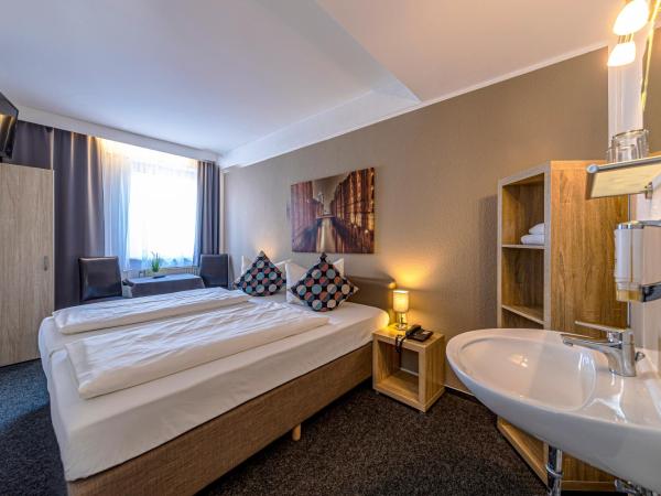 Auto-Parkhotel : photo 7 de la chambre chambre double ou lits jumeaux