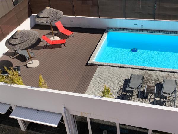 Casa dos Carvalhos : photo 3 de la chambre chambre double ou lits jumeaux deluxe - vue sur piscine