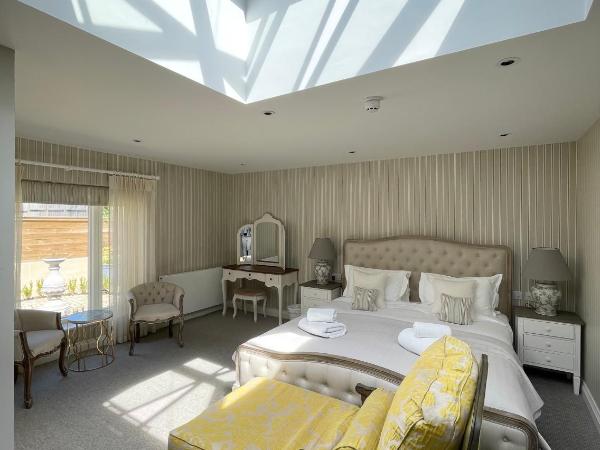 Tyndall Villa Boutique B&B : photo 3 de la chambre hébergement lit super king-size deluxe - vue sur jardin