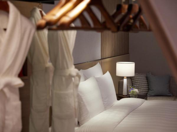 Lotte Hotel World : photo 2 de la chambre suite junior familiale avec lits jumeaux