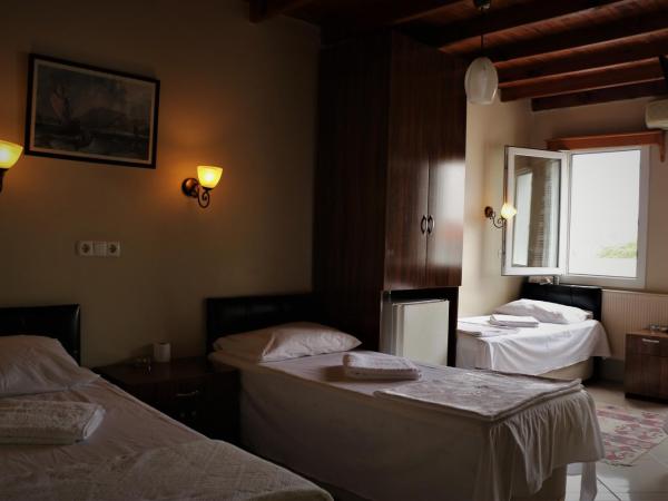 Durak Hotel : photo 9 de la chambre chambre quadruple