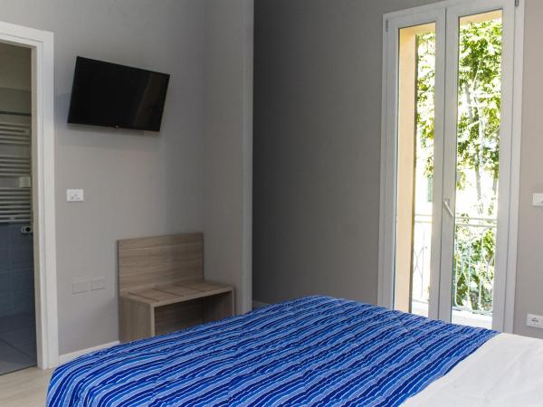 Hotel Sant'Orsola City House : photo 4 de la chambre chambre triple