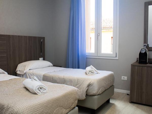 Hotel Sant'Orsola City House : photo 10 de la chambre chambre quadruple