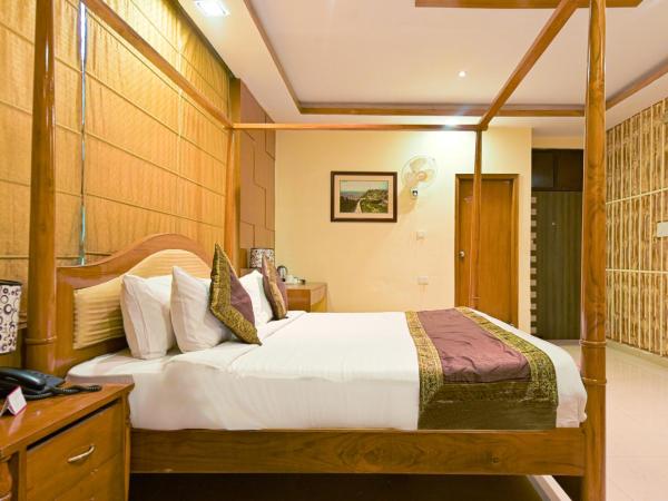 The Byke Grassfield Resort with Outdoor Pool, Shyam Nagar, Jaipur : photo 3 de la chambre suite lit king-size