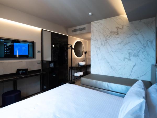 Heart Hotel Milano : photo 1 de la chambre chambre triple