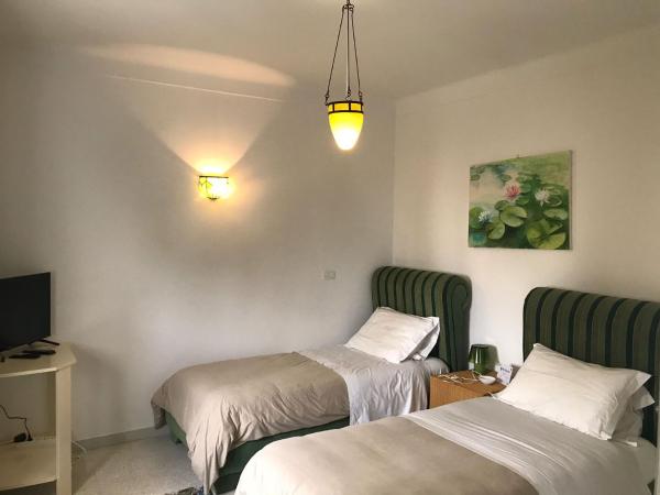 Villa Phoenicia : photo 2 de la chambre chambre lits jumeaux smeraldo 