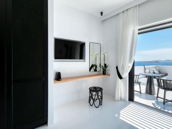 Tagoo Black Mykonos : photo 9 de la chambre chambre double de luxe avec piscine privée - vue sur mer