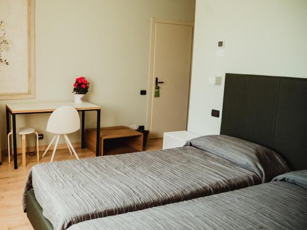 NIDO DEL GELSO : photo 2 de la chambre chambre double - vue sur jardin