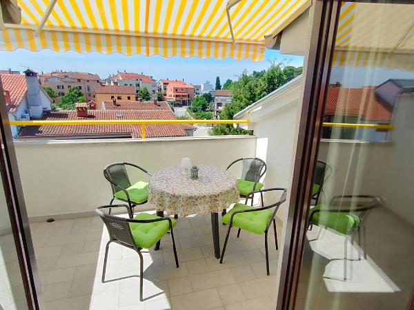 Apartments and Rooms Irena : photo 1 de la chambre appartement 2 chambres avec balcon