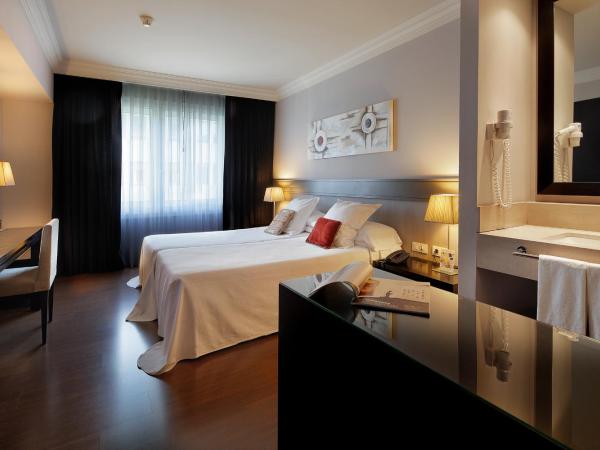 Hotel Condado : photo 7 de la chambre chambre double ou lits jumeaux - vue sur ville