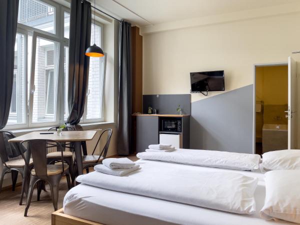 Five Elements Hostel Leipzig : photo 1 de la chambre chambre quadruple