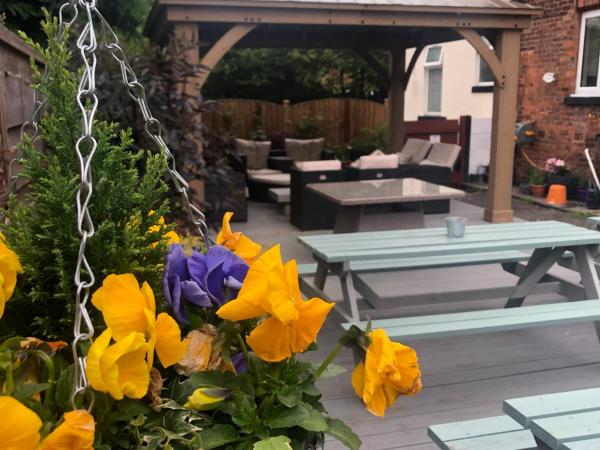 Hendham House : photo 10 de la chambre chambre quadruple avec salle de bains commune