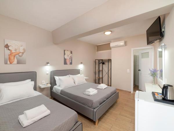 Faros Rooms : photo 9 de la chambre chambre triple avec terrasse - vue sur mer
