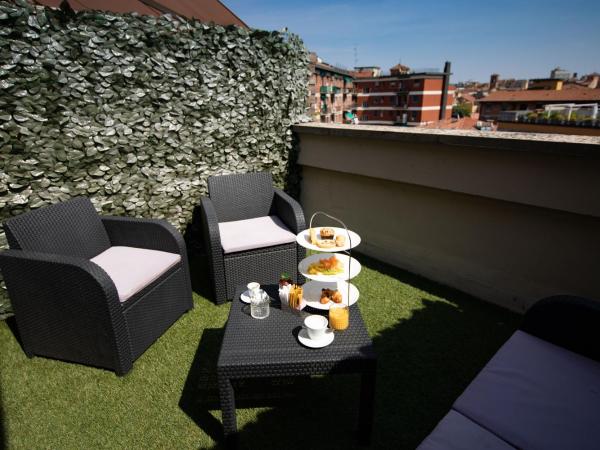 Boutique Hotel Re Enzo : photo 2 de la chambre chambre double avec terrasse - vue sur ville
