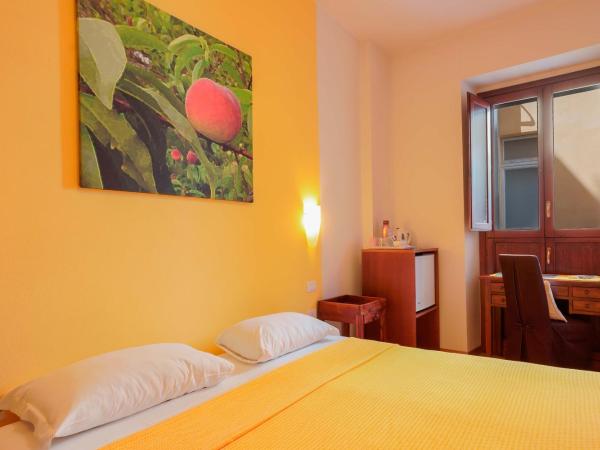 Le Suite Sul Corso : photo 3 de la chambre chambre triple